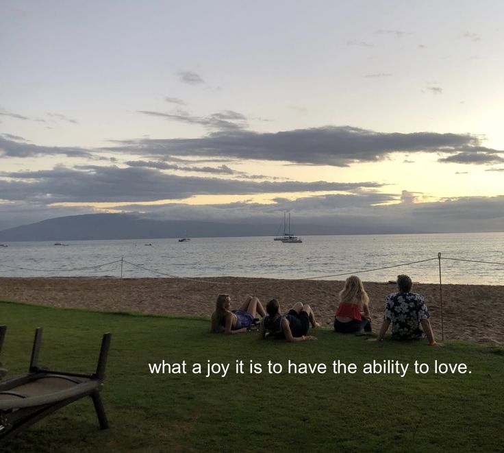 some people sitting on the grass by the water with boats in the background and a quote about what a joy it is to have the ability to love