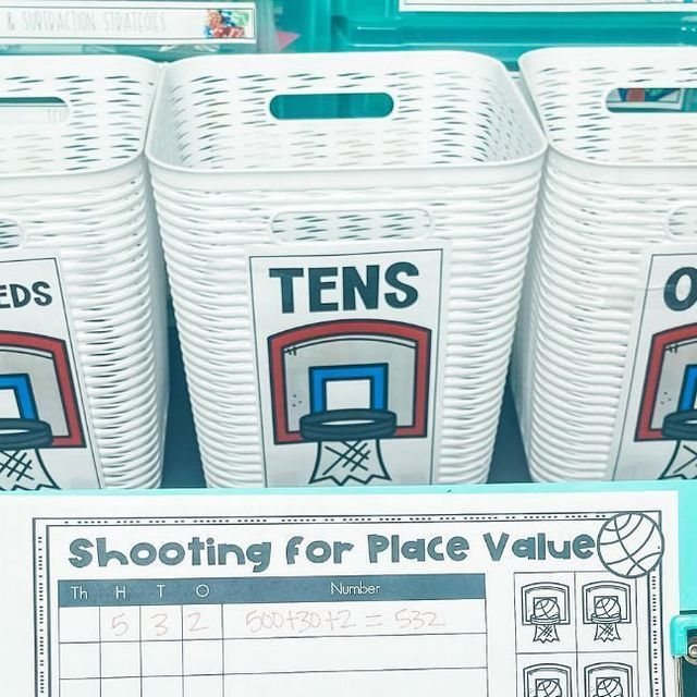 some baskets are lined up in front of each other and labeled with ten's