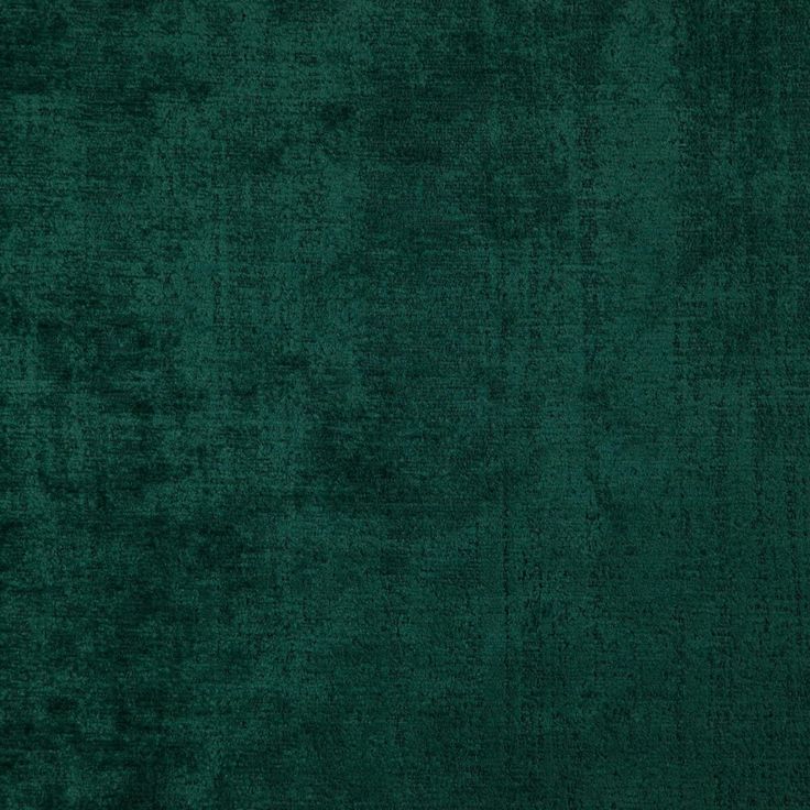 a dark green background that is very soft and velvety, it looks like something out of