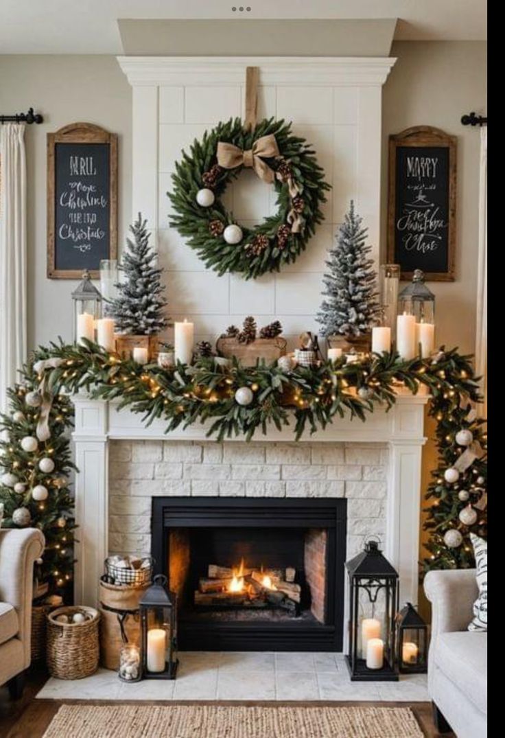 a living room decorated for christmas with candles and wreaths on the fireplace mantel