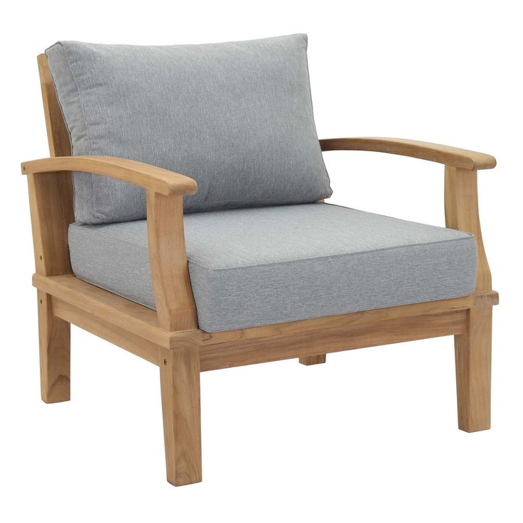 a wooden chair with grey cushions on it