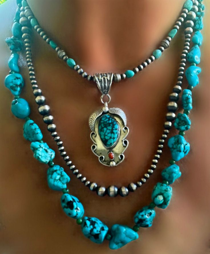 💙🍃You are looking at a stunning turquoise nugget  necklace that is adjustable between 21" and 23"! There is a smooth, round, small, green spacer bead in one of the two available necklaces that separates each blue larger nugget. The other necklace has small black spacer beads. These are very cool necklace. Make thempart of your Southwestern lineup! This particular necklace has tiny black spacer beads in between the turquoise nuggets. Only one necklace left. Listing is for one necklace only🍃💙 Cheap Turquoise Necklaces With Natural Stones, Cheap Polished Turquoise Beads Jewelry, Cheap Turquoise Jewelry With Adjustable Cord, Cheap Turquoise Necklace As Gift, Cheap Turquoise Necklace As A Gift, Cheap Turquoise Hippie Jewelry, Cheap Turquoise Necklace For Gift, Affordable Statement Turquoise Necklace Gift, Cheap Adjustable Cord Turquoise Jewelry