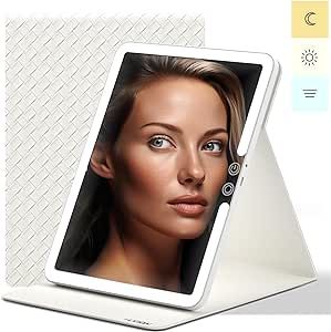 an image of a woman's face on the screen of a digital tablet computer