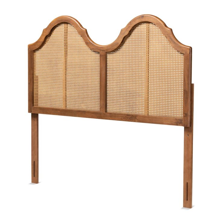 the headboard is made out of wood and has wicker panels on it's sides