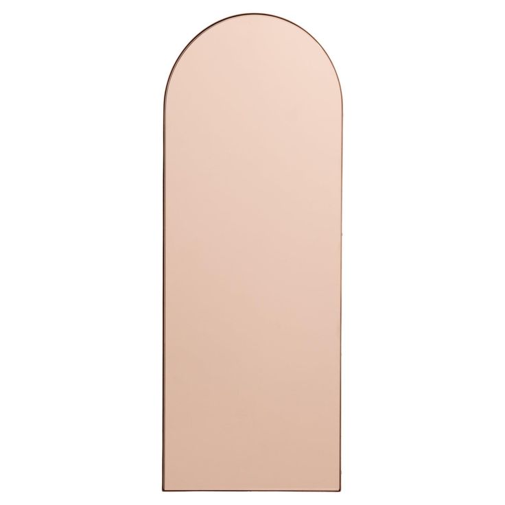 an arch shaped mirror is shown against a white background and has a light pink color