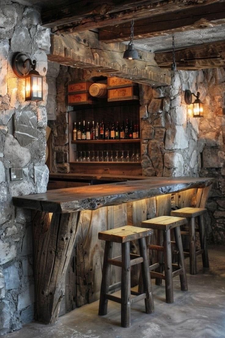 a stone bar with stools in front of it