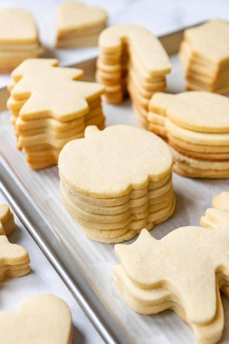 some cookies that are sitting on a cookie sheet and ready to be cut into pieces