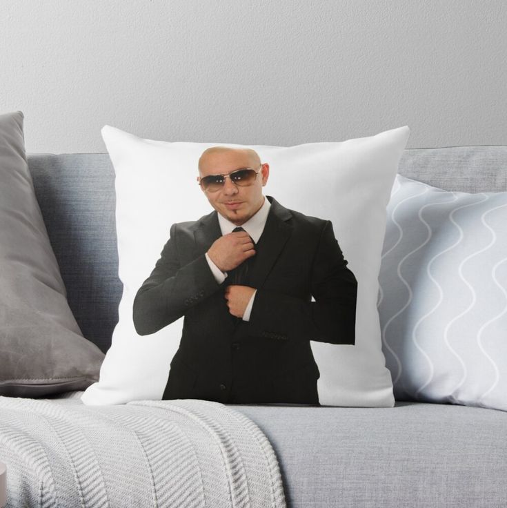 a man in a suit with sunglasses on his face and tie around his neck throw pillow