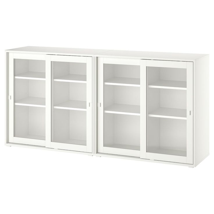 a white bookcase with two doors and three shelves on each side, both closed