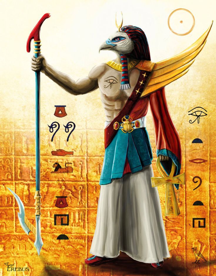 an egyptian man holding a staff with symbols on it