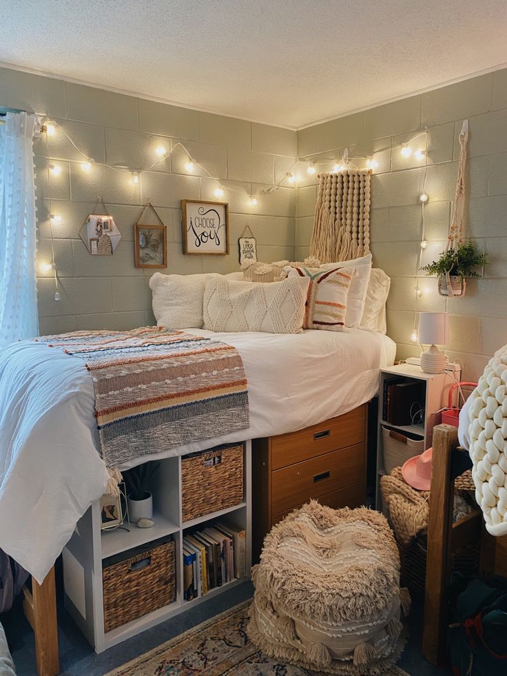 a bedroom with lights on the wall and a bed in the middle, surrounded by baskets