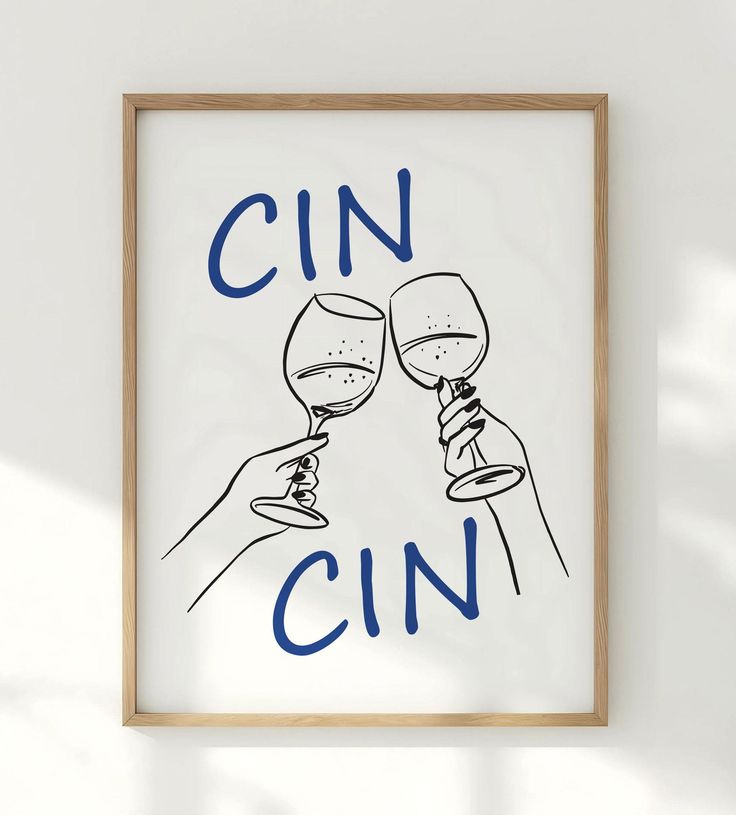 two glasses of wine are toasting in front of the word cin on a white wall