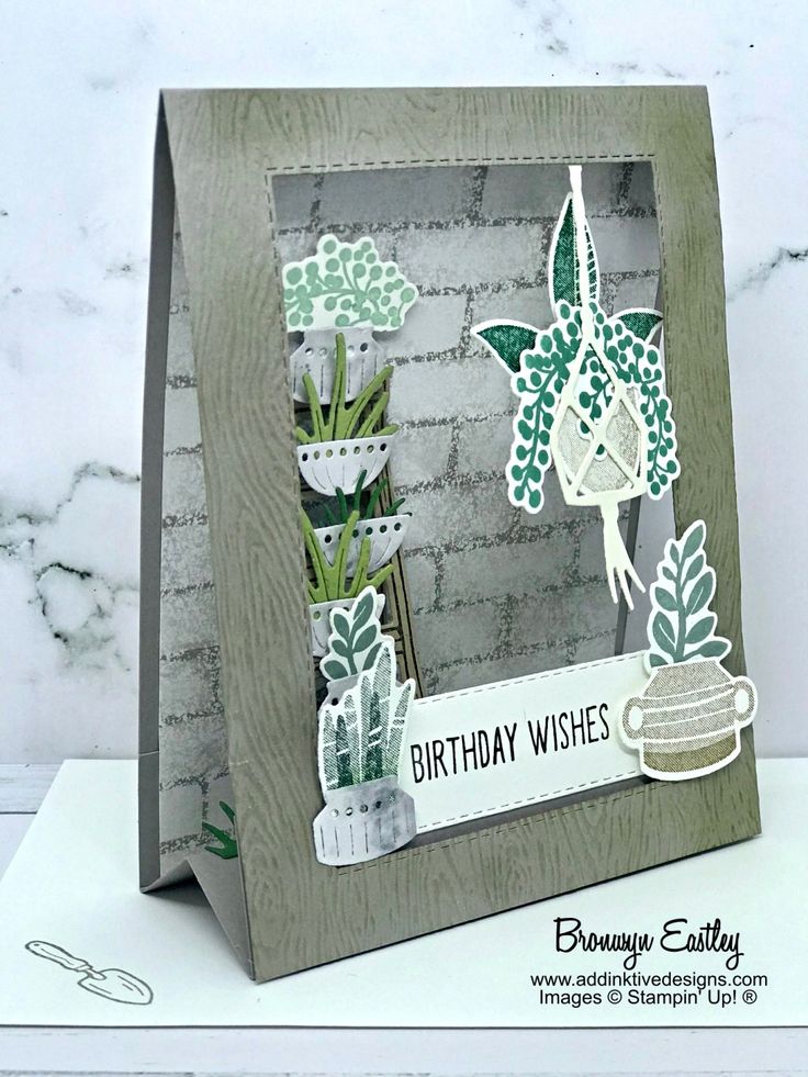 a birthday card with some plants on it