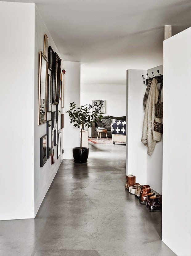 the hallway is clean and ready to be used as a storage area for shoes or other items