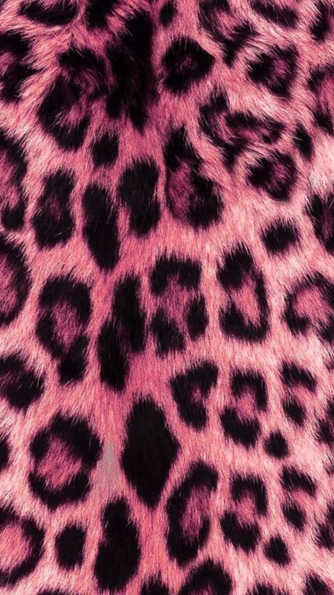 an animal print fabric with pink and black spots on the fur, as well as other patterns