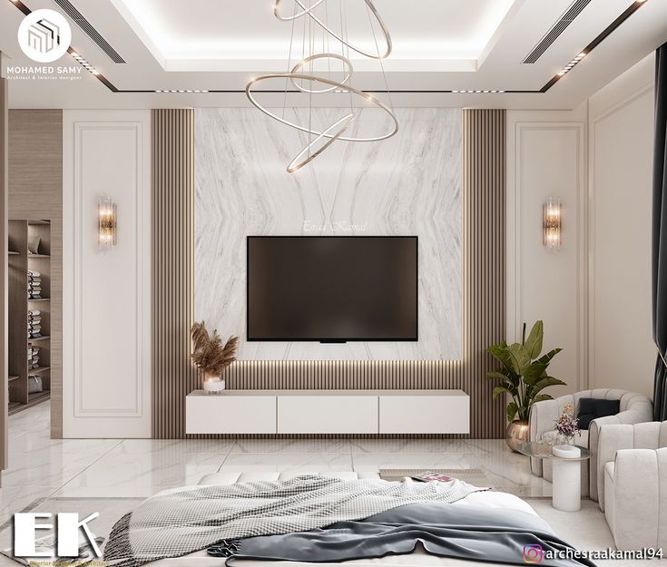 a modern living room with white furniture and a large flat screen tv