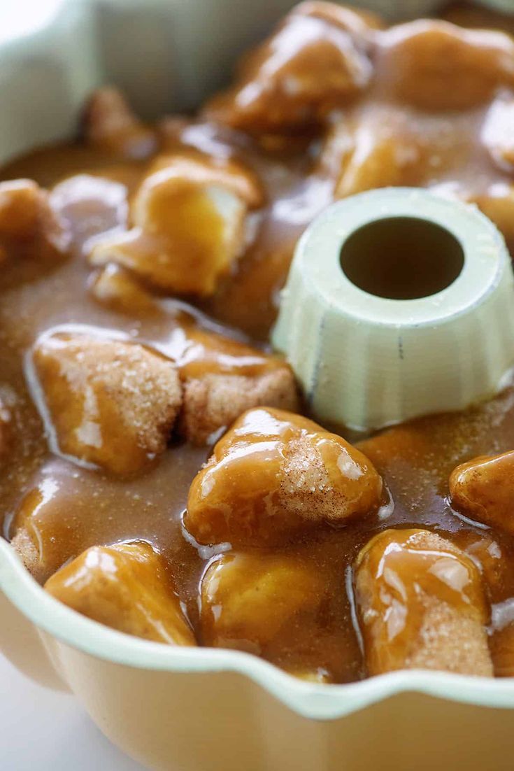 a close up of a cake pan filled with some kind of dessert in the middle