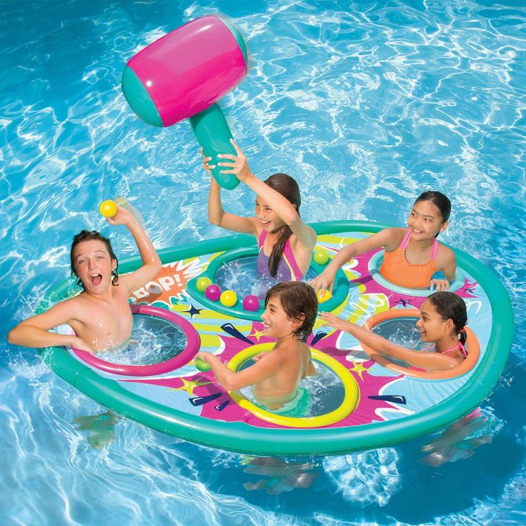 The Banzai Whopper Bopper Inflatable Pool Float Game offers a unique summer variation on a traditional game. Participants emerge from gopher holes on the inflatable mat, attempting to seize soft-touch balls before being struck by an inflatable hammer. Suitable for up to five players, it's perfect for individuals aged 8 and older. With dimensions of 92 inches by 60 inches, it promises to be an exciting new feature for poolside entertainment. Swimming Pool Floats, Swimming Pool Accessories, Inflatable Pool Floats, Pool Games, Tide Pools, Water Play, Pool Toys, Inflatable Pool, Traditional Games