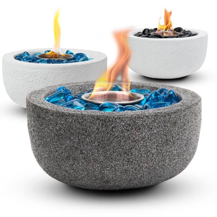 two bowls with fire and water in them, one is white and the other is grey