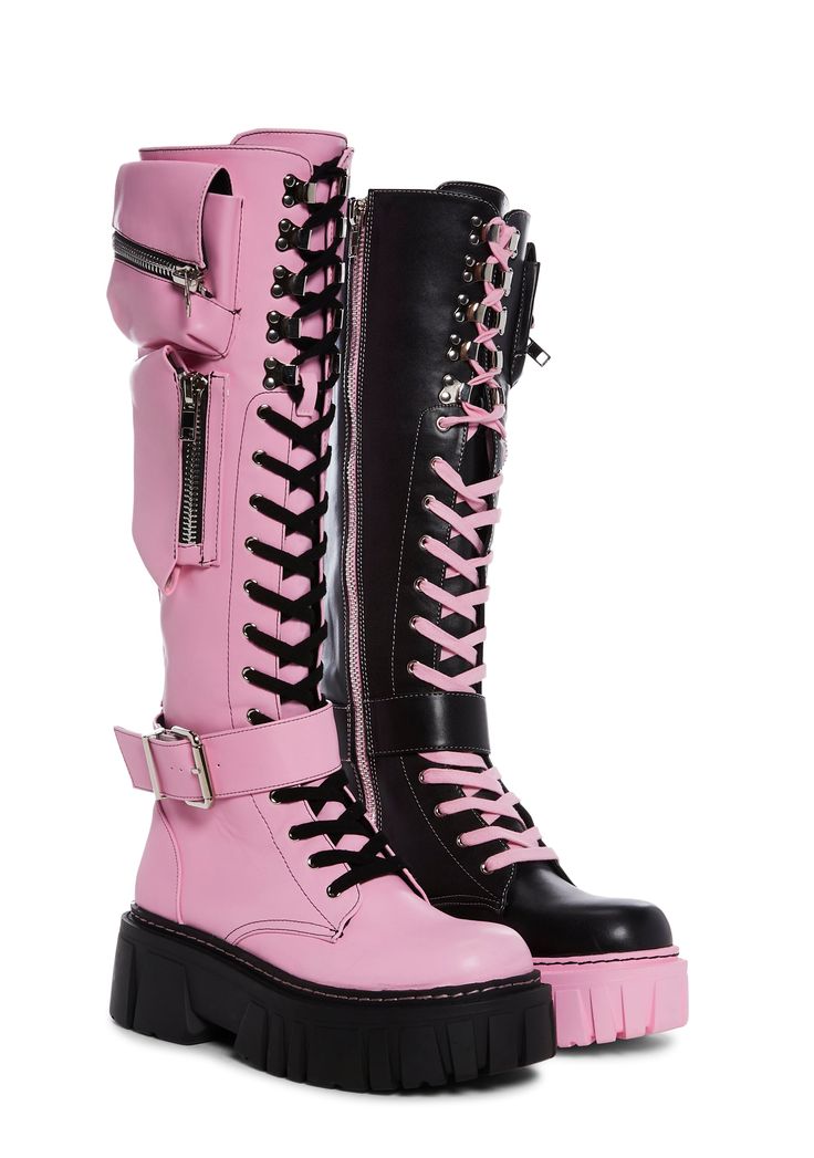 will have you winning every battle. These knee high combat boots have a vegan leather construction, heeled platform soles, zippered pockets on the sides, buckle strap details, adjustable lace-ups, and side zip closures. Knee High Boots Lace Up, Skeleton Boots, Pink Knee High Boots Outfit, Gothic Inspired Fashion, Long Combat Boots, Dark Pink Heels, Colorful Platform Boots, Scene Boots, Knee High Leather Boots Outfit