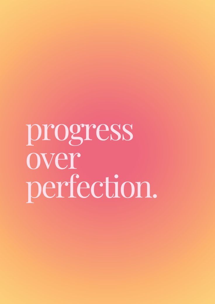 the words progress over perfection are shown in white on an orange and pink blurred background