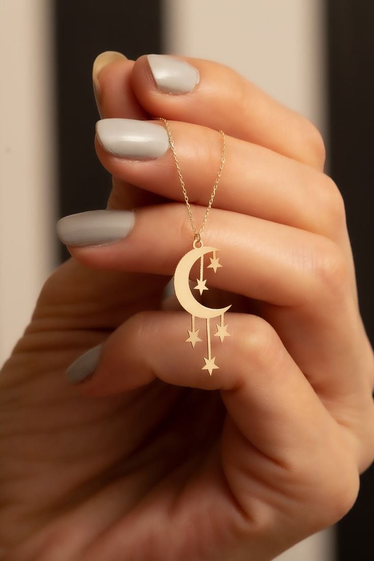 "14K Solid Gold Moon and Star Pendant Necklace /Crescent Moon Charm Necklace / Jewelry for Women / Mystic Gift For Her / Minimalist Necklace * Gold KT: 14K Solid Gold * Gold Color: 14k Yellow Gold * Chain Lengths: 14\", 15\", 16'' 18\", 20\", 22\", 24\" * The length of the chain in the photo is 18 inches * Pendant length: 2.60 cm * Pendant width: 1.10 cm Follow on Instagram - @bayargold.tr My Web Site - https://www.bayargold.com/ * Bayar Gold is a fine jewelry company. Please do not hesitate to ask us questions. We are always here to help you. * All items are packed in the high-quality jewelry box. The gift message is available. Please let us know what to write by leaving us a note at checkout. * Gift wrapping available. Express shipping * United States: 4-6 business days * Canada: 4-6 bus Dainty Charm Necklace, Moon Gift Ideas, Cute Necklaces Aesthetic, A Jewelry, Moon And Star Pendant, Sagittarius Pendant, Crescent Moon Necklace Gold, Simple Necklaces, Inexpensive Jewelry