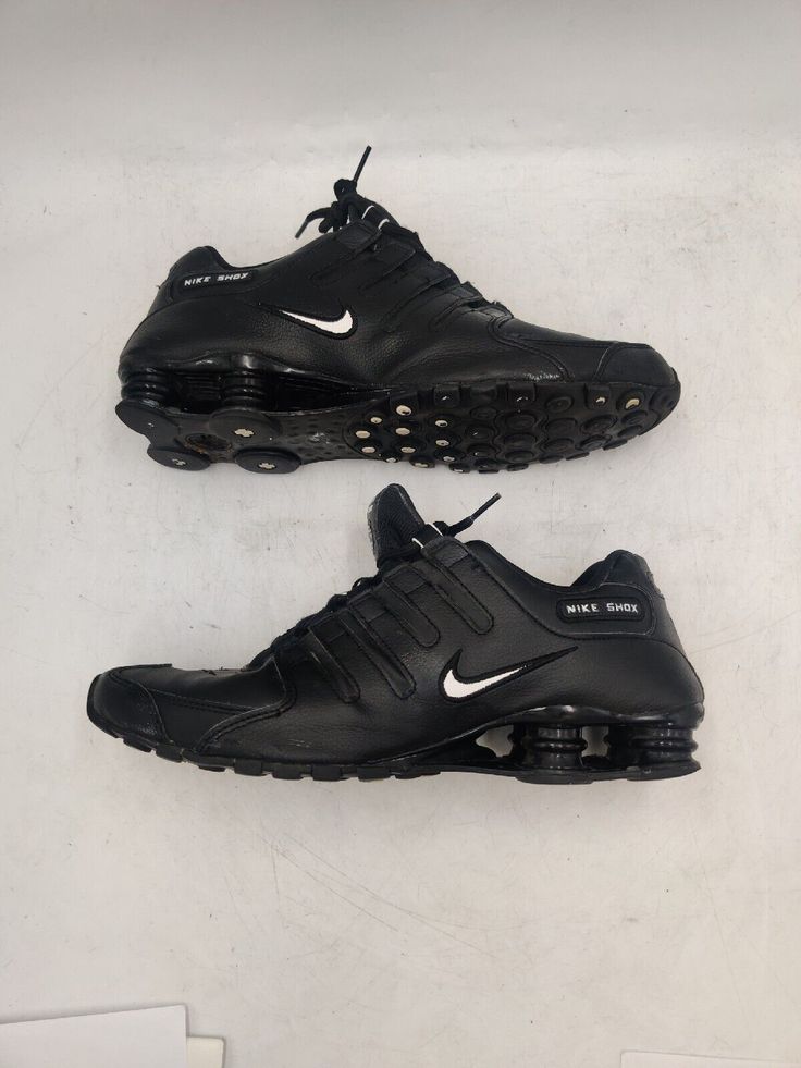 Elevate your athletic game with these Nike Shox NZ running shoes. Featuring a sleek triple black design, these sneakers are perfect for any casual or workout occasion. The lace-up closure ensures a secure fit, while the arch support, cushioned sole, and overall comfort make them ideal for any performance or activity, from cross training to running and jogging. Crafted with a leather upper and rubber outsole, these Nike Shox shoes are durable and built to last. With a standard shoe width and US s Shox Shoes, Nike Shox Shoes, Nike Shox Nz, Brown Leather Ankle Boots, Nike Shox, Nike Fashion, Triple Black, Black Sneakers, Athletic Fashion