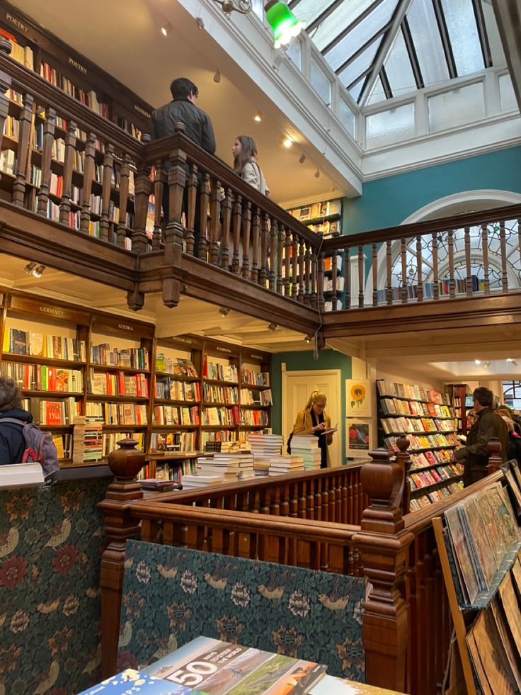 the inside of a library with many books on shelves