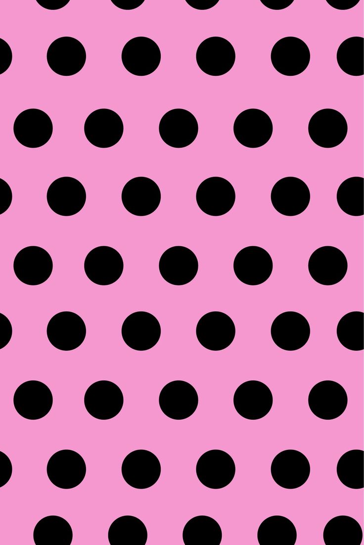 a pink and black polka dot background