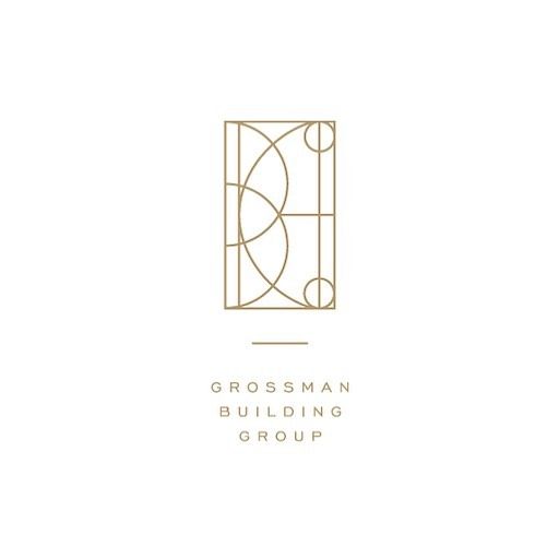 the logo for grossman building group, which is designed in gold and white with an abstract