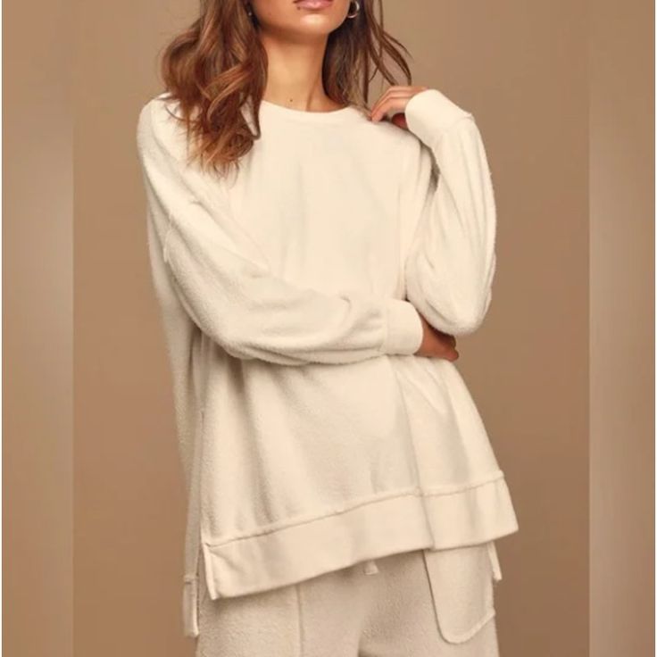 Nwt Lulu's Choosing Chill Fleece Knit Pullover Sweatshirt In White Size X-Small Xs New With Tags In Original Packaging. No Flaws. The Lulus Choosing Chill White Fleece Knit Pullover Sweatshirt Was Made For Laid Back Weekends At Home! Fuzzy Fleece Knit Creates A Faux Sherpa Effect As It Shapes This Cozy Sweatshirt With A Round Neckline, Long Sleeves With Drop Shoulders, And An Oversized Bodice Ending In A Notched High-Low Hem. Pair With The Matching Pants For A Complete Look! Self: 70% Rayon, 30% Dolman Sleeve Sweater, White Fleece, Matching Pants, Oversized Silhouette, Cozy Sweatshirts, Knit Pullover, Knitted Pullover Sweaters, Cup Size, White Sweatshirt