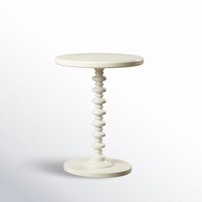 a small white table on a white background