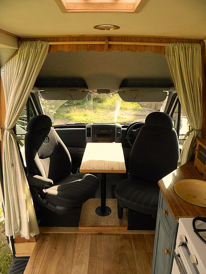 Small table between front seats. Van Tables, Husbil Makeover, Camper Van Kitchen, Kombi Motorhome, Small Camper, Camping 101, Kombi Home, Van Conversion Interior, Sprinter Van Conversion