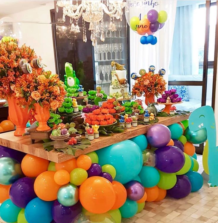 an instagram page with balloons and flowers on the table in front of it, which reads instagram