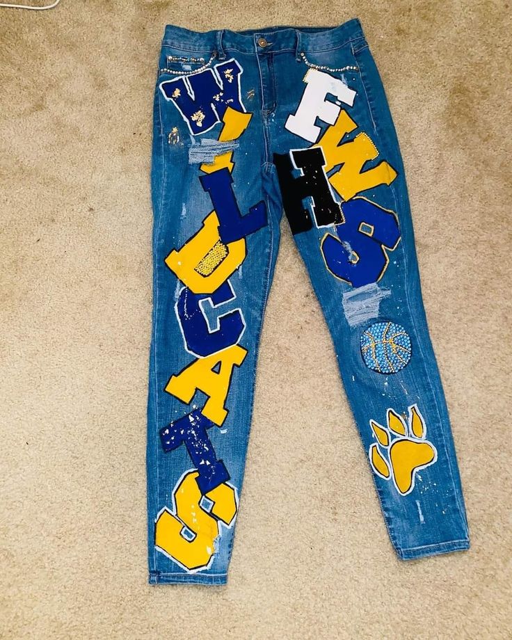 Custom Senior Pants, Blue And Gold Senior Jeans, Blue And Yellow Senior Jeans, Homecoming Painted Jeans, Painted Pants School Spirit, Painted Jeans Diy School Spirit, Red Bottom Heels Outfit, Homecoming Jeans Painted, Spirt Jeans Homecoming