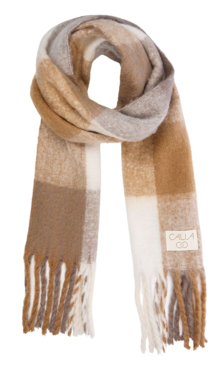 Wrap yourself in luxurious comfort with the CALIA Women's Luxe Scarf. This oversized scarf features soft, brushed woven fabric and stylish fringe ends, complete with a classy CALIA logo patch. Perfect for winter recreation, it makes an excellent stocking stuffer or holiday gift for the fashion-forward woman. Fit & Design Oversized scarf Soft, brushed woven fabric Fringe ends CALIA logo patch Winter Hats Women, Cute Scarfs Winter, Style Blanket Scarf, Plaid Scarves For Cold Weather In Winter, Womens Plaid Scarf, Blanket Scarf Plaid, Fuzzy Scarf, Tan Plaid, Fleece Scarf