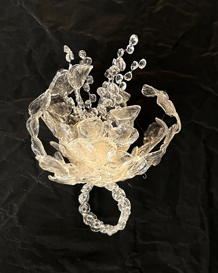 a glass vase with water and bubbles in it