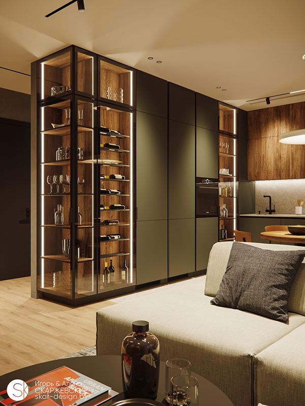 a living room filled with furniture and lots of glass shelves on the wall above it