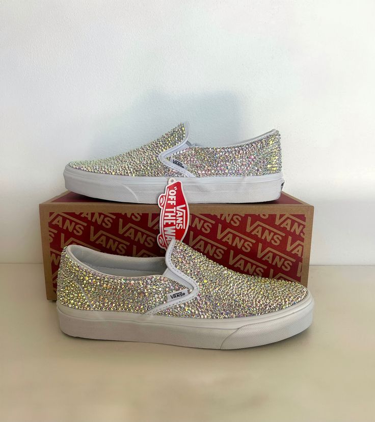 CUSTOM RHINESTONE VANS Great for: * Everyday wear * Wedding * Bar Mitzvah * Quincenaera * Sweet Sixteen Please be sure of size before purchasing Notes: * Each rhinestone is placed by hand * All shoes are blinged with careful detailing * Shoes are purchased when ordered * ALL SHOES ARE MADE TO ORDER! Sizes: * Women's 3.5-12 INTERESTED IN A DIFFERENT COLOR? No Worries. Simply send me a message with the color of your choice and I would be more than happy to make your ideas come to life. Each Order Comes With: * Fully Rhinestoned Shoes * Original Box * Extra Rhinestones Rhinestone Vans Shoes, Glamorous Sparkling White Wedding Shoes, Glamorous White Sparkling Wedding Shoes, Silver Round Toe Wedding Shoes With Rhinestones, Silver Rhinestone Wedding Shoes With Round Toe, Silver Wedding Shoes With Rhinestones And Round Toe, Rhinestone Vans, Vans Wedding Shoes, Shoes Quinceanera