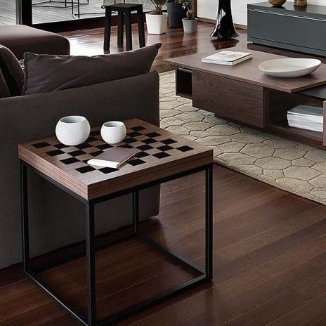 a living room filled with furniture and a coffee table