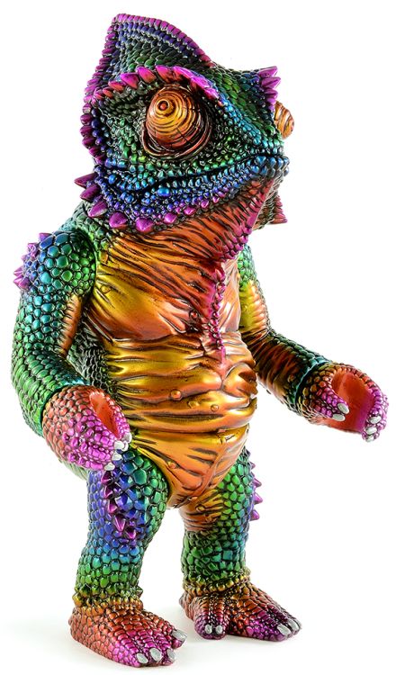 a colorful toy dinosaur standing on its hind legs and holding it's paws up