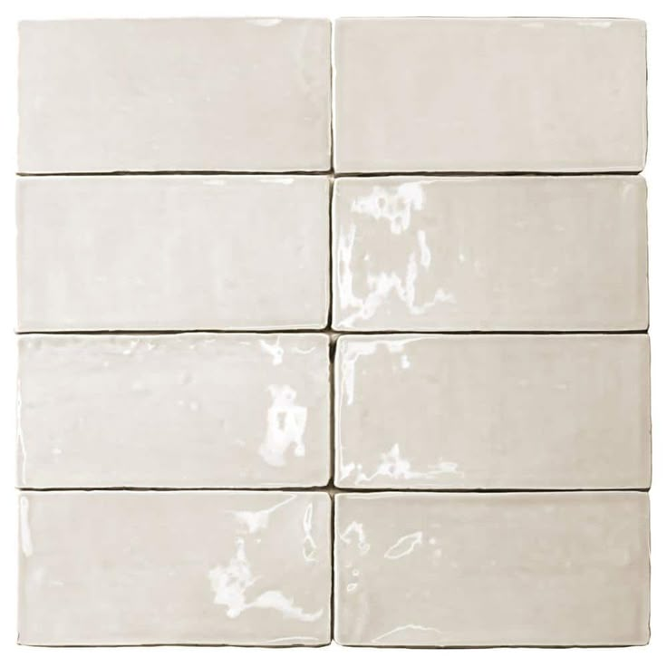 six square white ceramic tiles on a white background