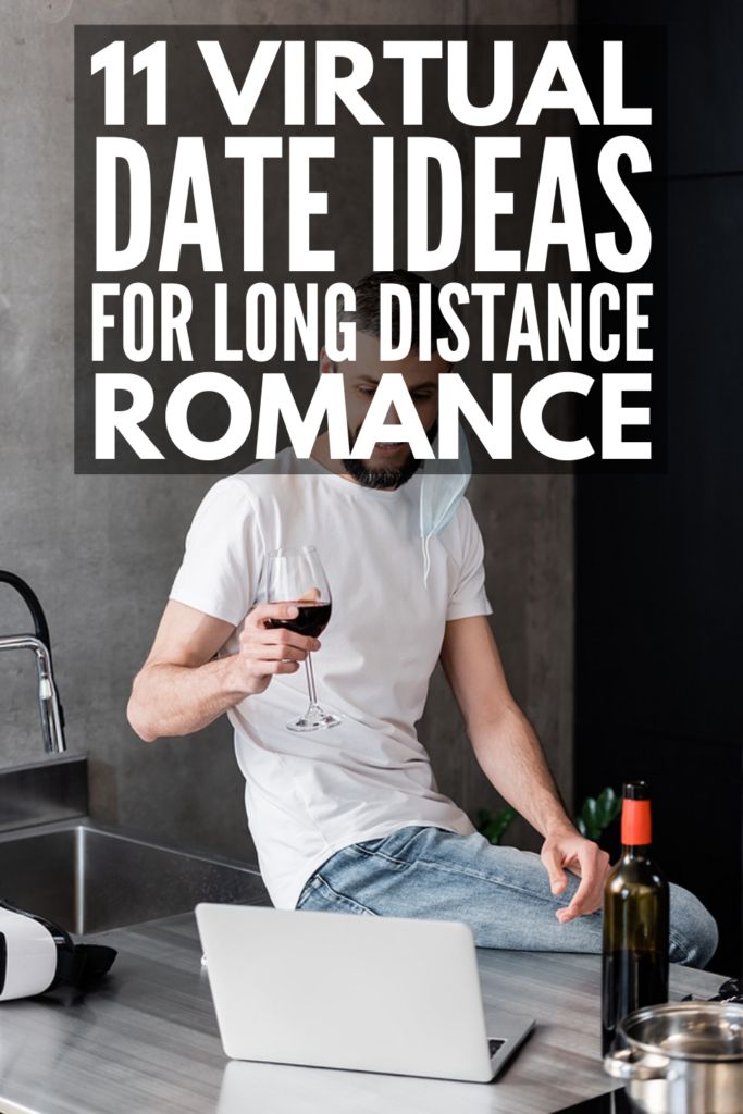 a man sitting at a kitchen counter with a glass of wine in his hand and the words, 11 virtual date ideas for long distance romance