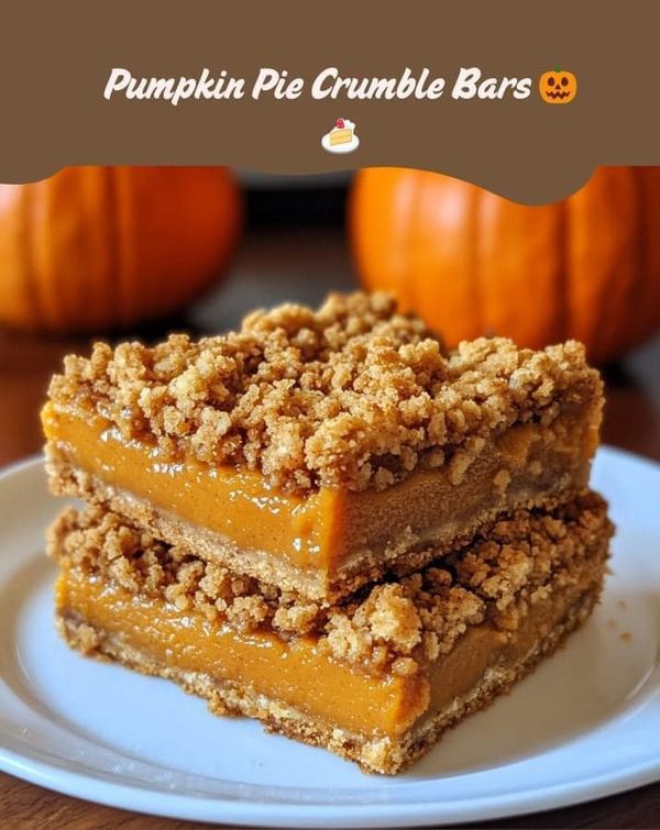 three pieces of pumpkin pie crumble bars on a white plate with two pumpkins in the background