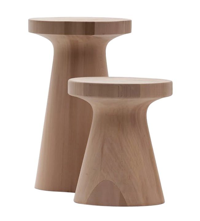 two wooden stools sitting next to each other