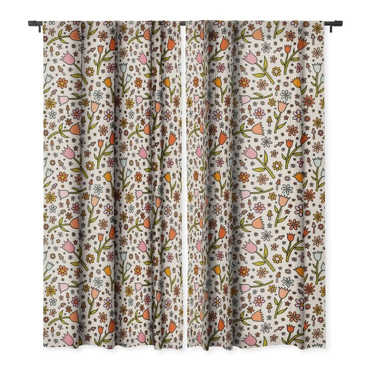 an open window curtain with flowers and leaves on it, in front of a white background