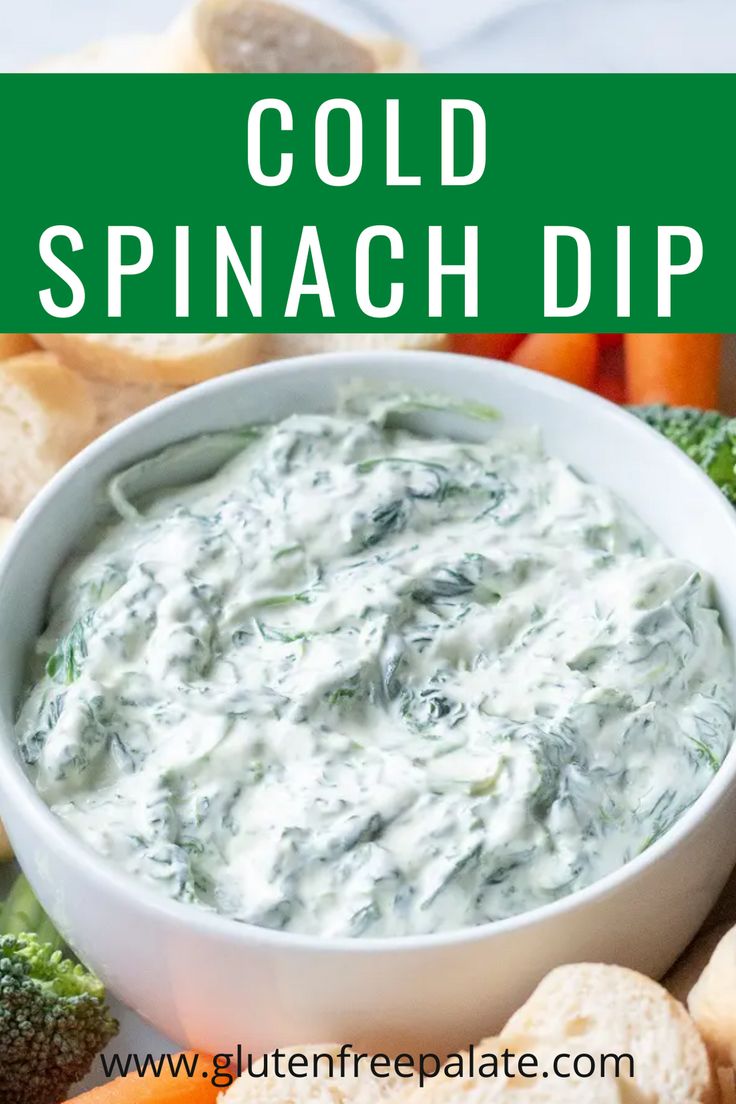 a white bowl filled with spinach dip surrounded by broccoli