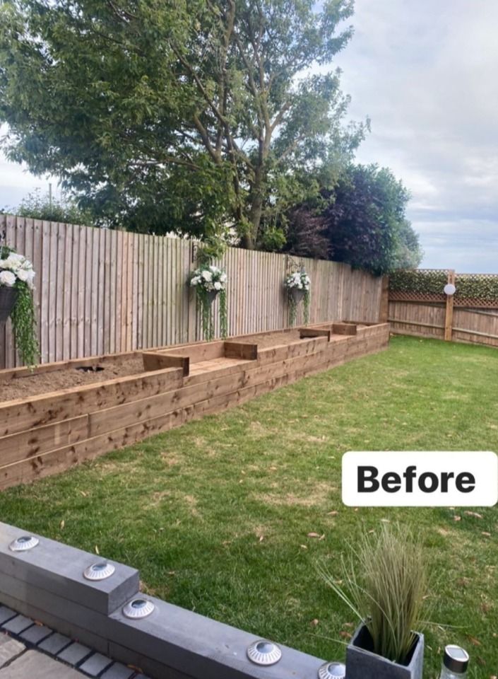 the before and after shot of a backyard garden with raised planters, retaining wall, and wooden fence