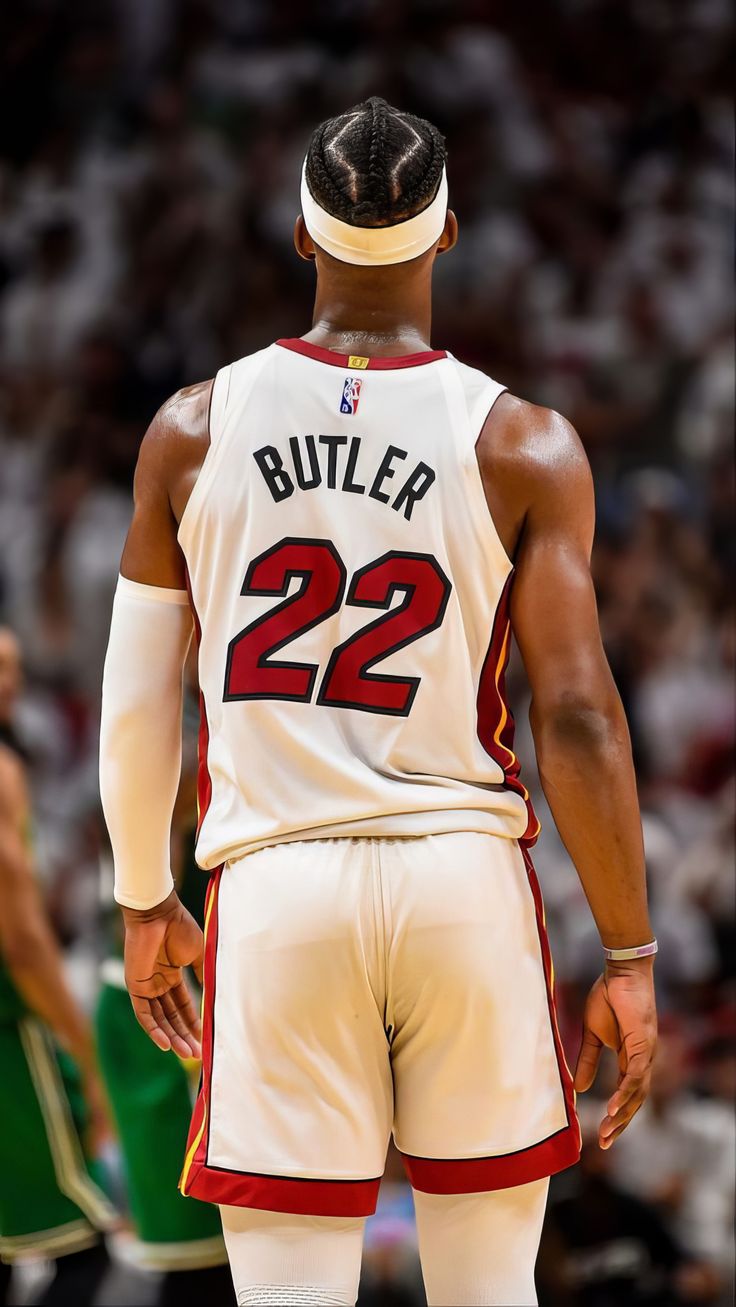 the back of a basketball player's jersey with his name on it and number 22