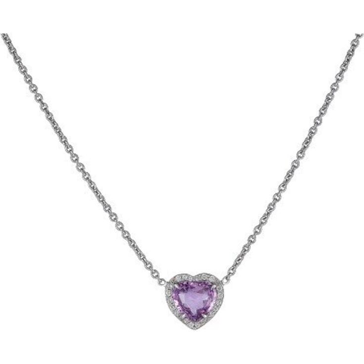 Indulge in a piece of jewelry that truly captures the essence of your heart's desires. This stunning Heart Pendant in Purple Sapphire is a statement of your unique style and passion. The 2.53 carat heart-shaped Purple Sapphire is the centerpiece of this necklace, surrounded by 0.11 carats of dazzling round diamonds. The necklace is set in 18K White Gold, giving it a luxurious finish that will make you feel like royalty.Whether you're treating yourself or someone special, this Heart Pendant in Pu Elegant Round Gemstone Heart Necklace, White Gold Heart Cut Gemstone Necklace, Elegant Gemstone Heart Pendant Necklace, Elegant White Gold Heart Necklace With Gemstone, Elegant Gemstone Heart Necklace For Anniversary, Elegant Heart Pendant Jewelry With Brilliant Cut, Elegant Heart Cut Gemstone Heart Necklace, Elegant Heart Necklace With Cubic Zirconia, Elegant Heart Necklace With Cubic Zirconia Gemstone